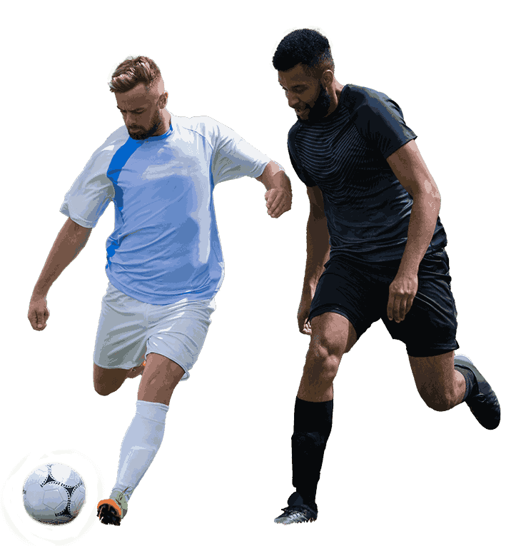 football players playing soccer in the ground